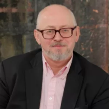 Matthew Bishop, American Editor of the Economist, participates in a mini-symposium of The New Philanthropy: Prospects and Challenges